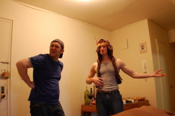 A pilgrim (Drew) and an Indian (Joe) at the first Thanksgiving